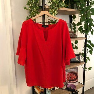 red keyhole neckline blouse with flounce sleeves